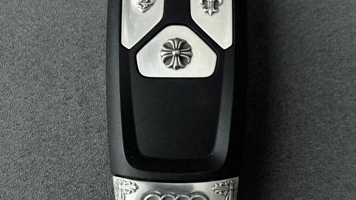 Nickel silver Audi key case front view showing solid metal tone and precision engraved details
