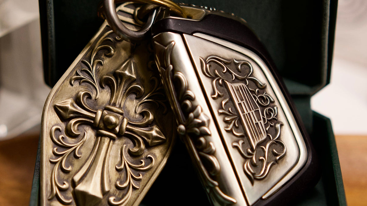 Cadillac handcrafted silver key case displayed with its engraved key tag