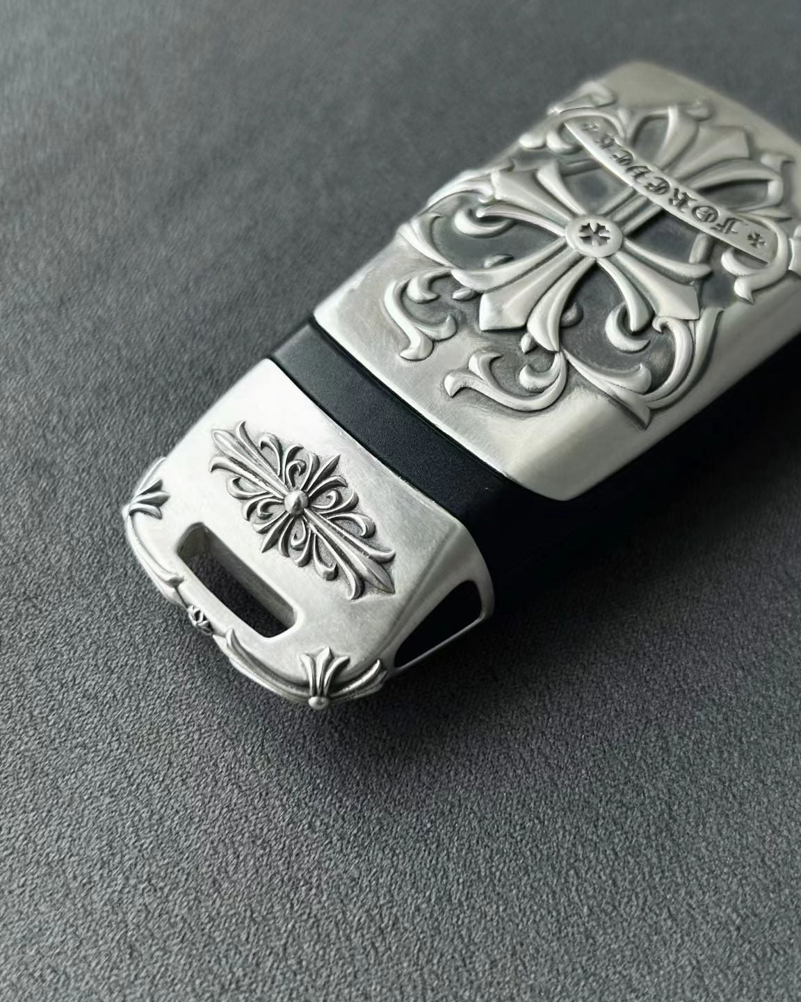 Precision engraved Audi four rings logo on handmade silver key case bottom detail