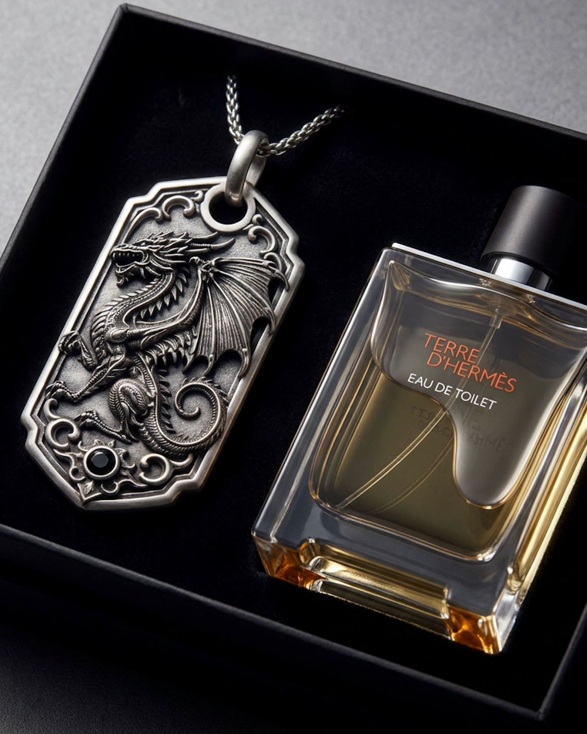 Bespoke dragon-motif key tag, displayed beside fragrance bottle