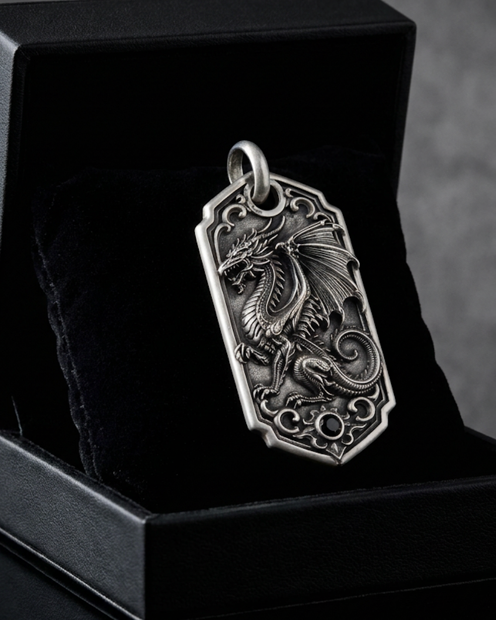 Bespoke dragon-motif key tag, presentation box view