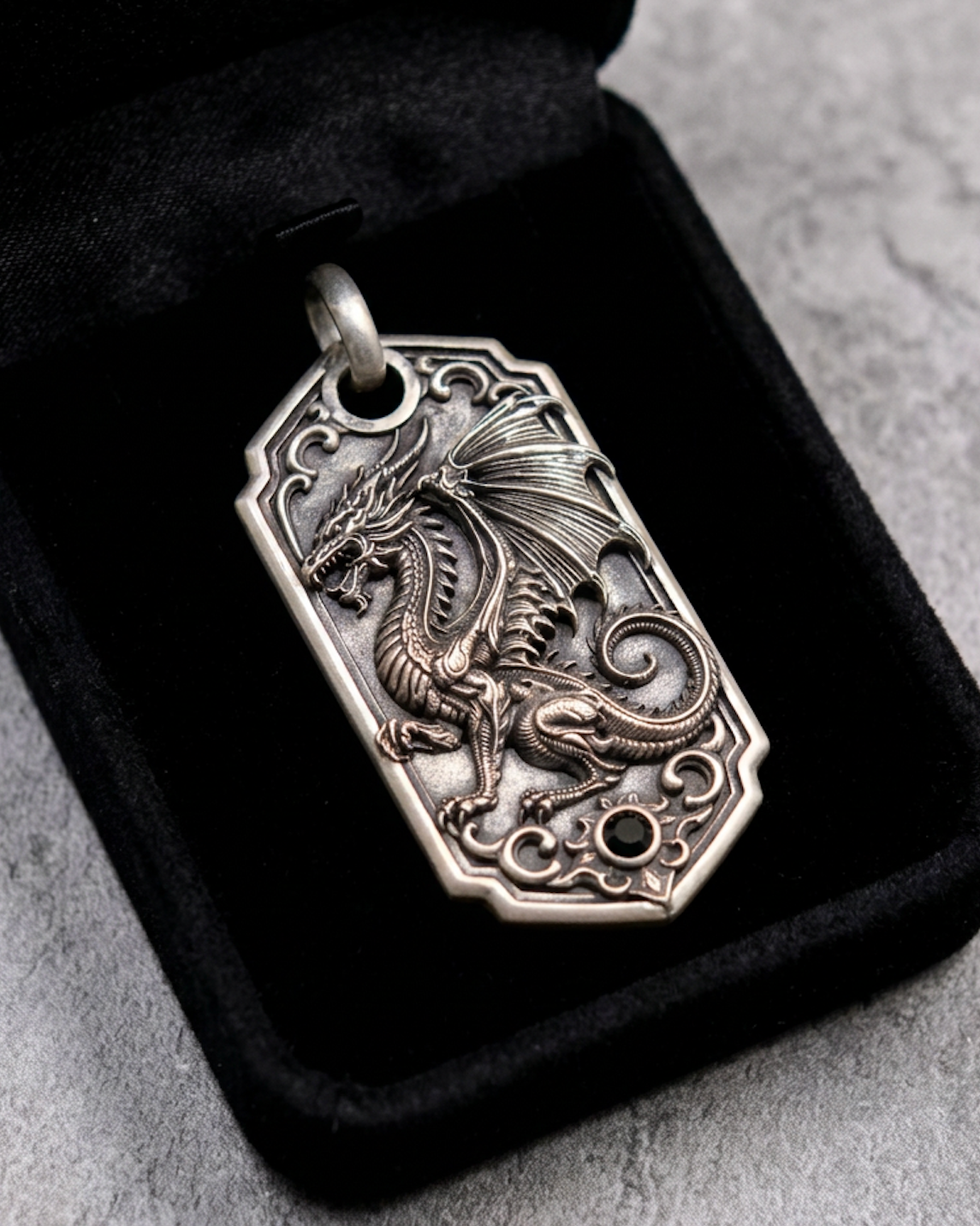 Bespoke dragon-motif key tag, presentation pouch view