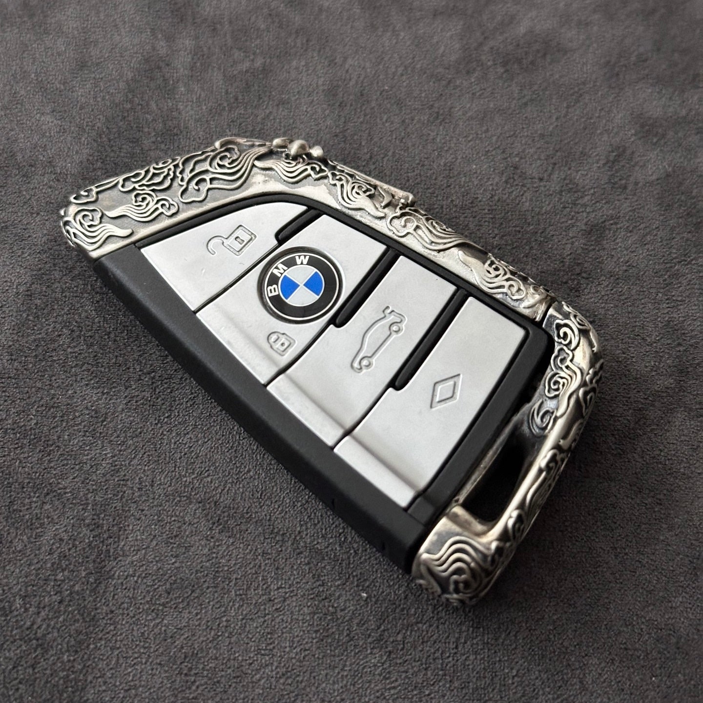 BMW E90 key case in 925 sterling silver with cloud style ultra-matte finish and hand-engraved border, designed for 2006-2014 3-series sedans