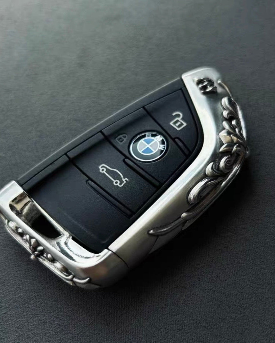 BMW Slim Edge handcrafted key case Nickel Silver front view with refined edge detailing and BMW logo integration on original key fob