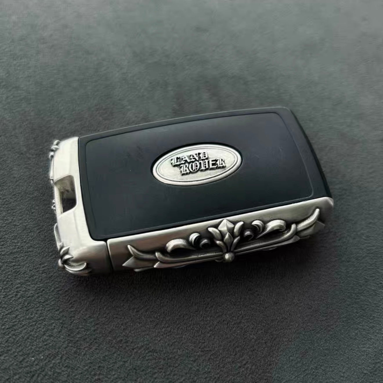 Land Rover Logo Back handcrafted key case Nickel Silver front view with refined edge detailing and iconic Land Rover emblem integration