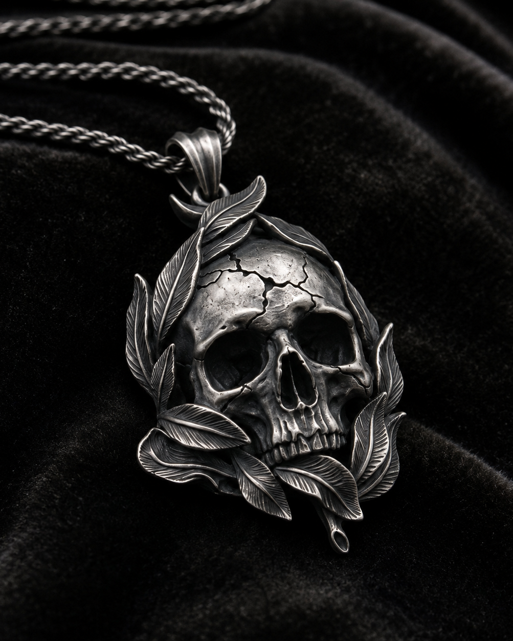 Memento Mori Skull & Feather Pendant, held for scale