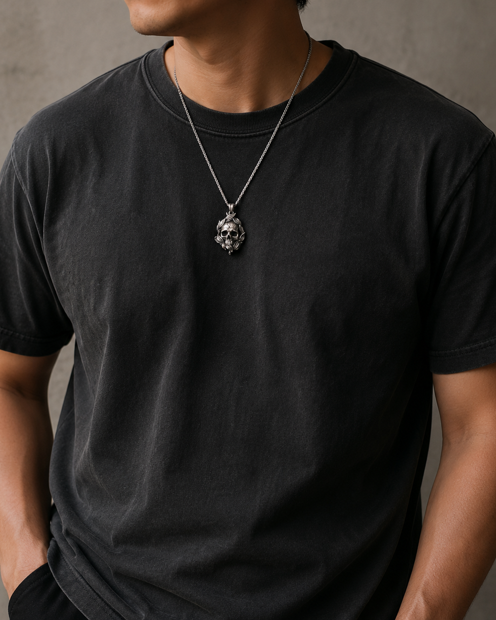 Memento Mori Skull & Feather Pendant, worn on a chain