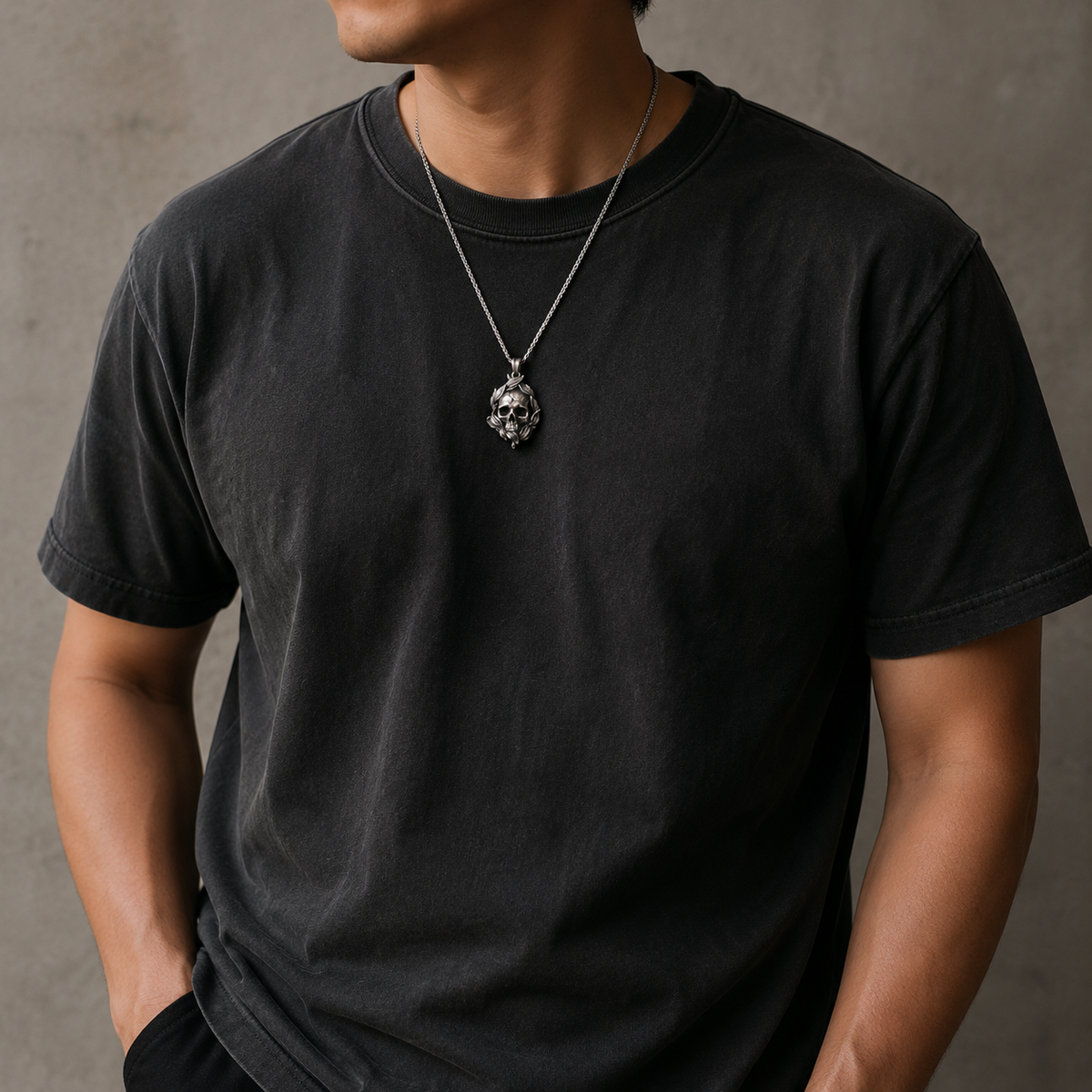 Memento Mori Skull & Feather Pendant, worn on a chain