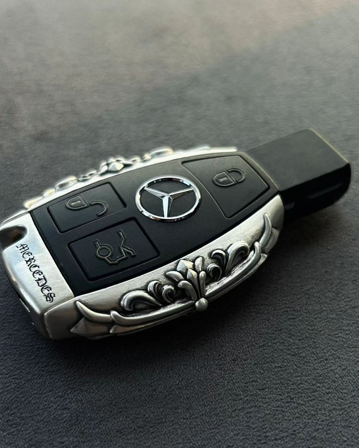 Handcrafted silver car key case, front view