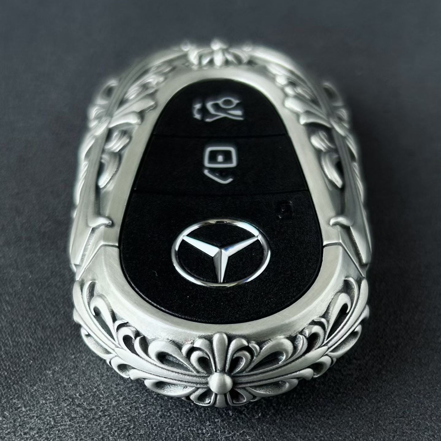 IGNIS ARGENTUM Mercedes key case side profile showing slim fit edge arc and substantial build without interfering button operation