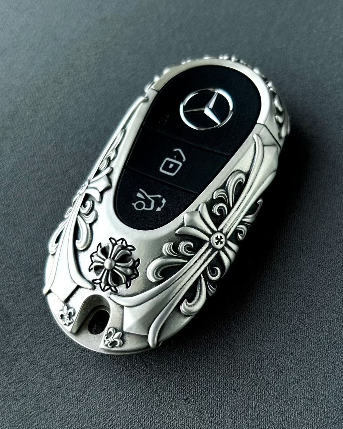 Mercedes Rounded Capsule Silver Key Case, front three-quarter view