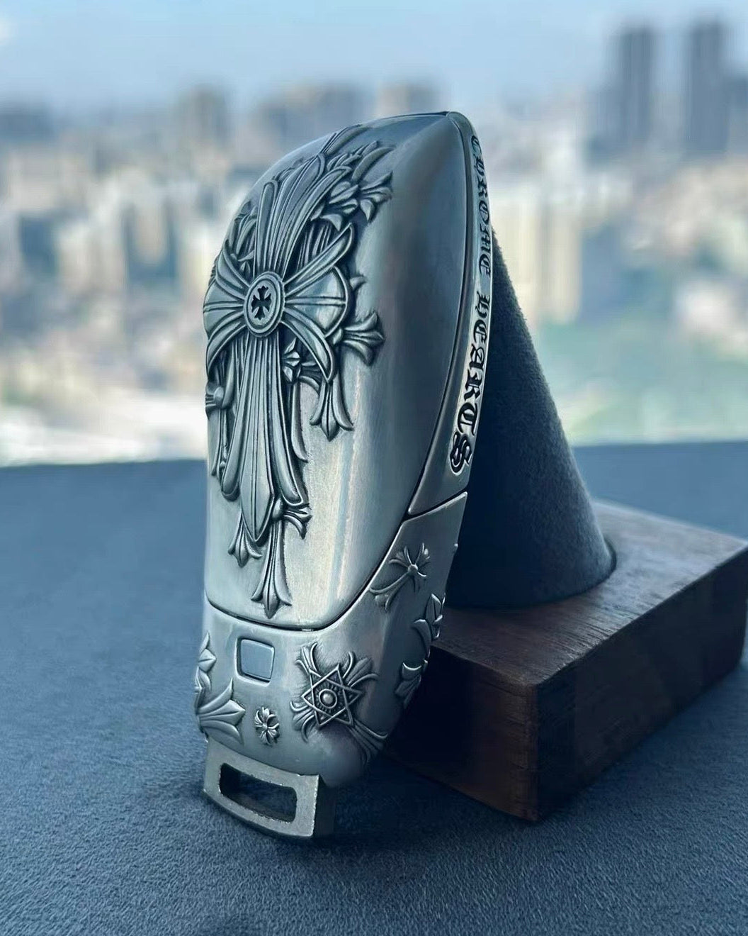 Hand-finished floral cross engraving detail on IGNIS ARGENTUM Mercedes slim rectangle key case side view showing refined craftsmanship