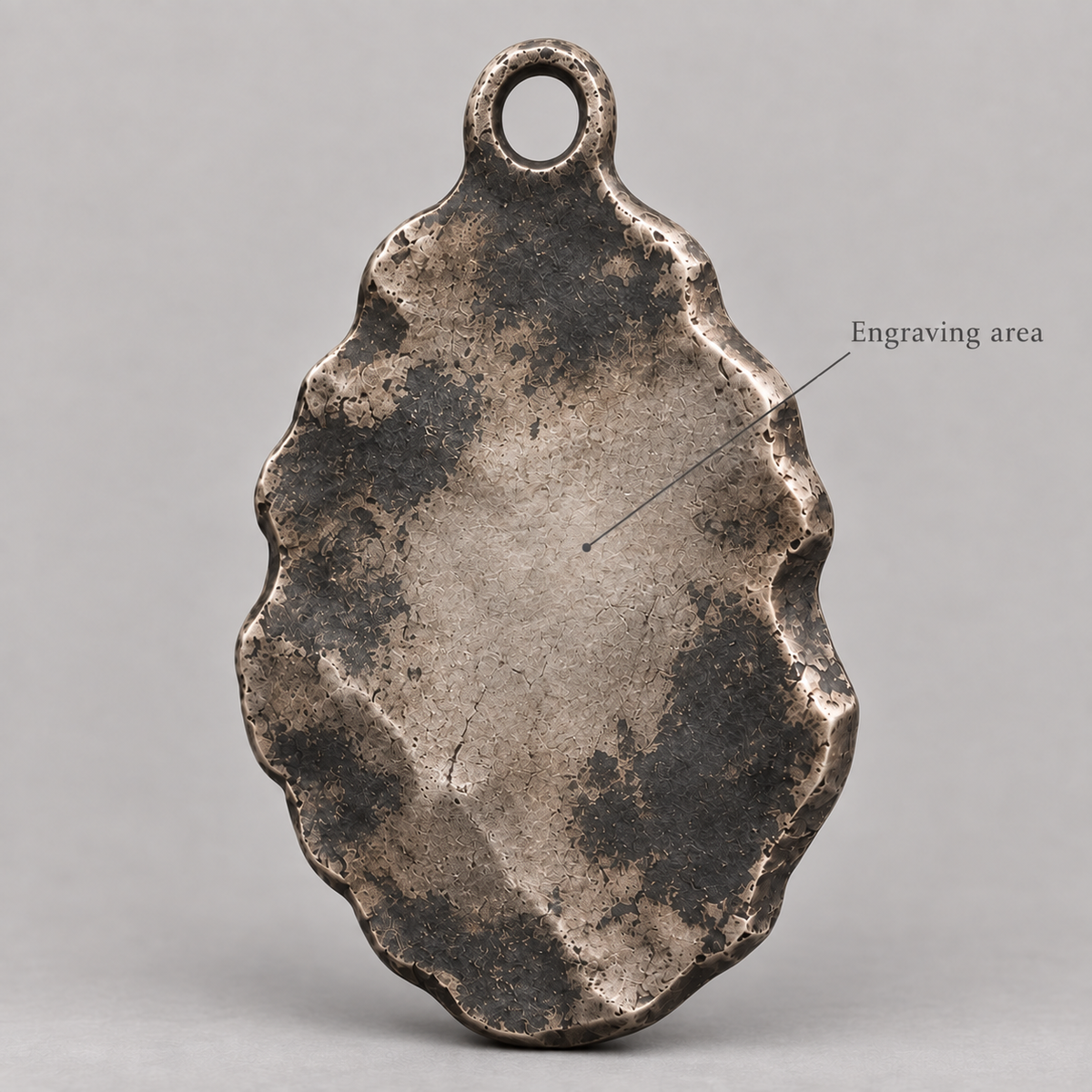 Athena keychain charm design preview, back view, showing the rear texture and engraving area