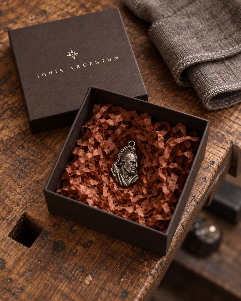Ares MYTHOS charm — IGNIS ARGENTUM gift box styling; design visualization