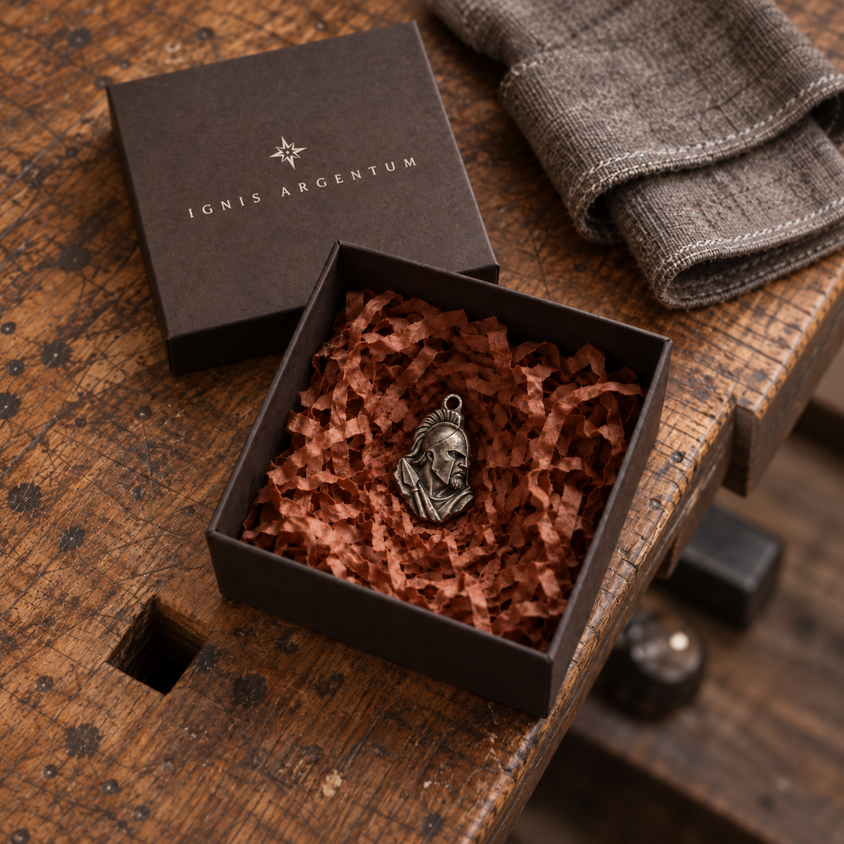 Ares MYTHOS charm — IGNIS ARGENTUM gift box styling; design visualization