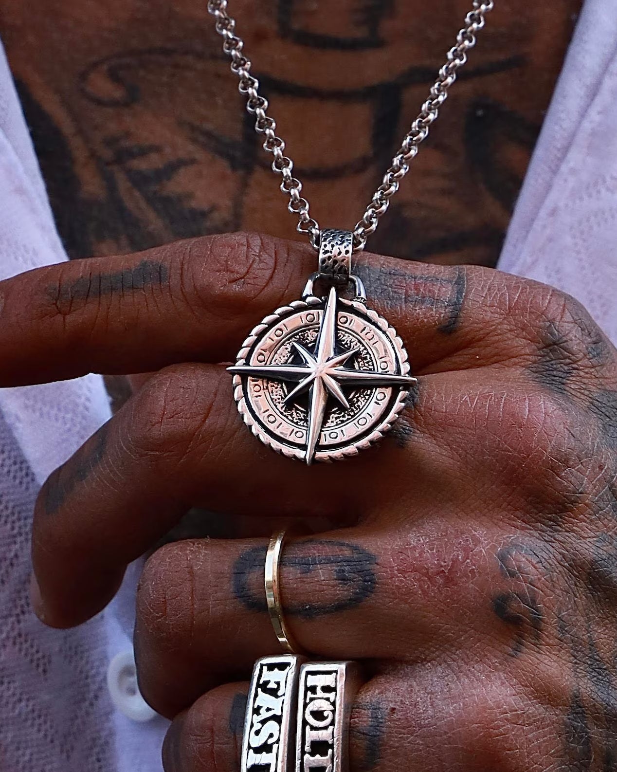 Nautical Compass 925 Silver Pendant, front view beside a car key