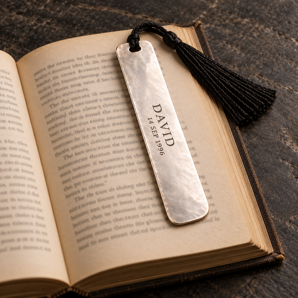 Personalized bookmark on an open book