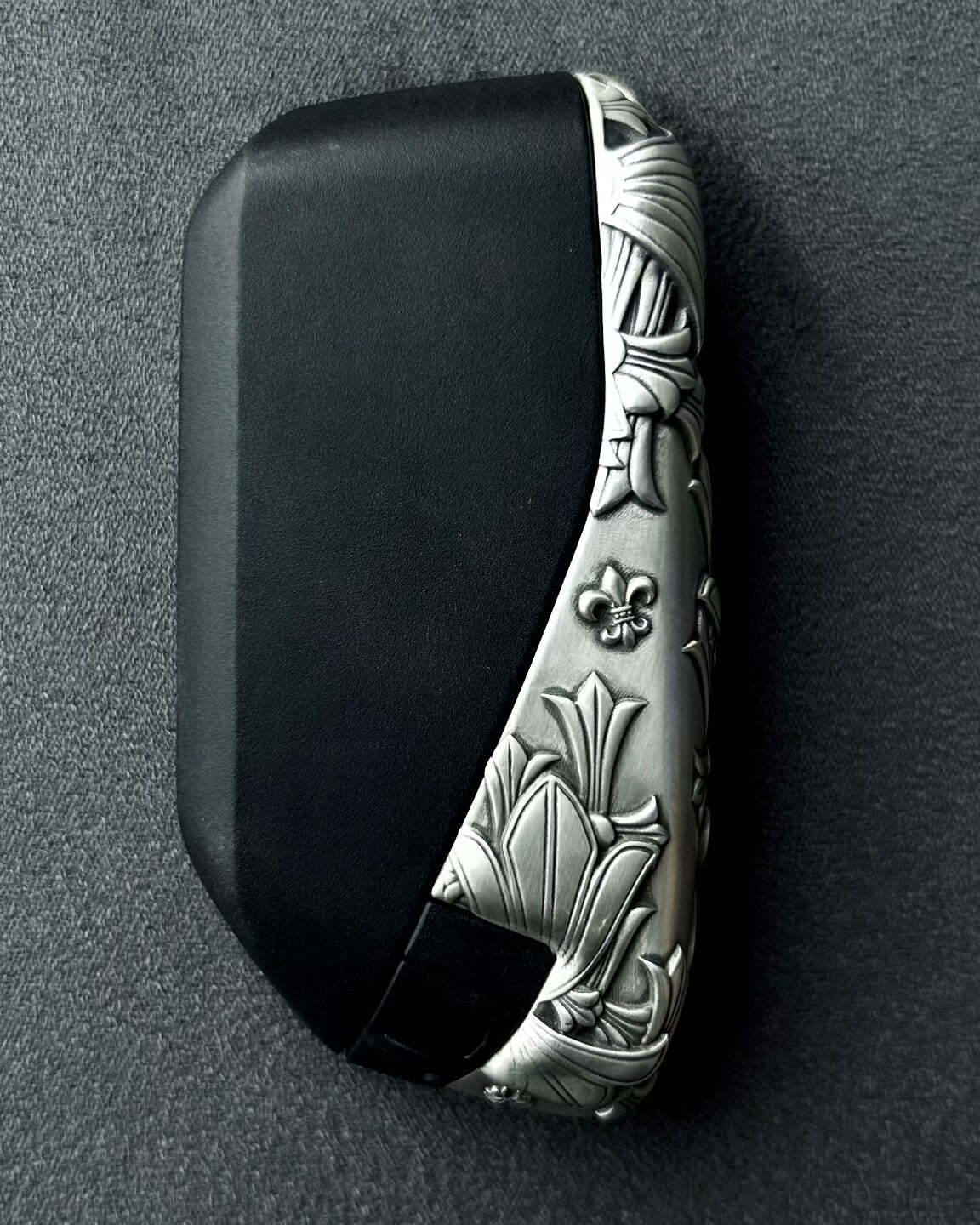Side profile showing hand-finished faceted blade design on 925 Sterling Silver frame
