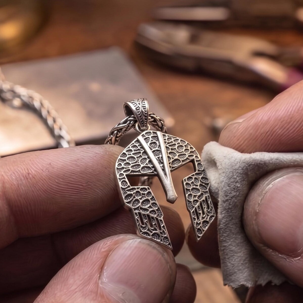 Spartan Helmet 925 Silver Pendant, held for scale
