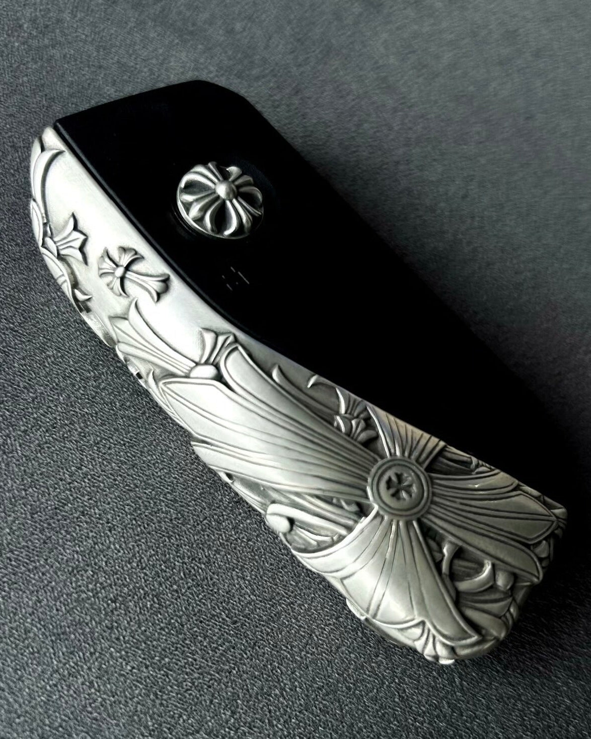 Sterling Silver BMW key case displayed with understated elegance on dark surface