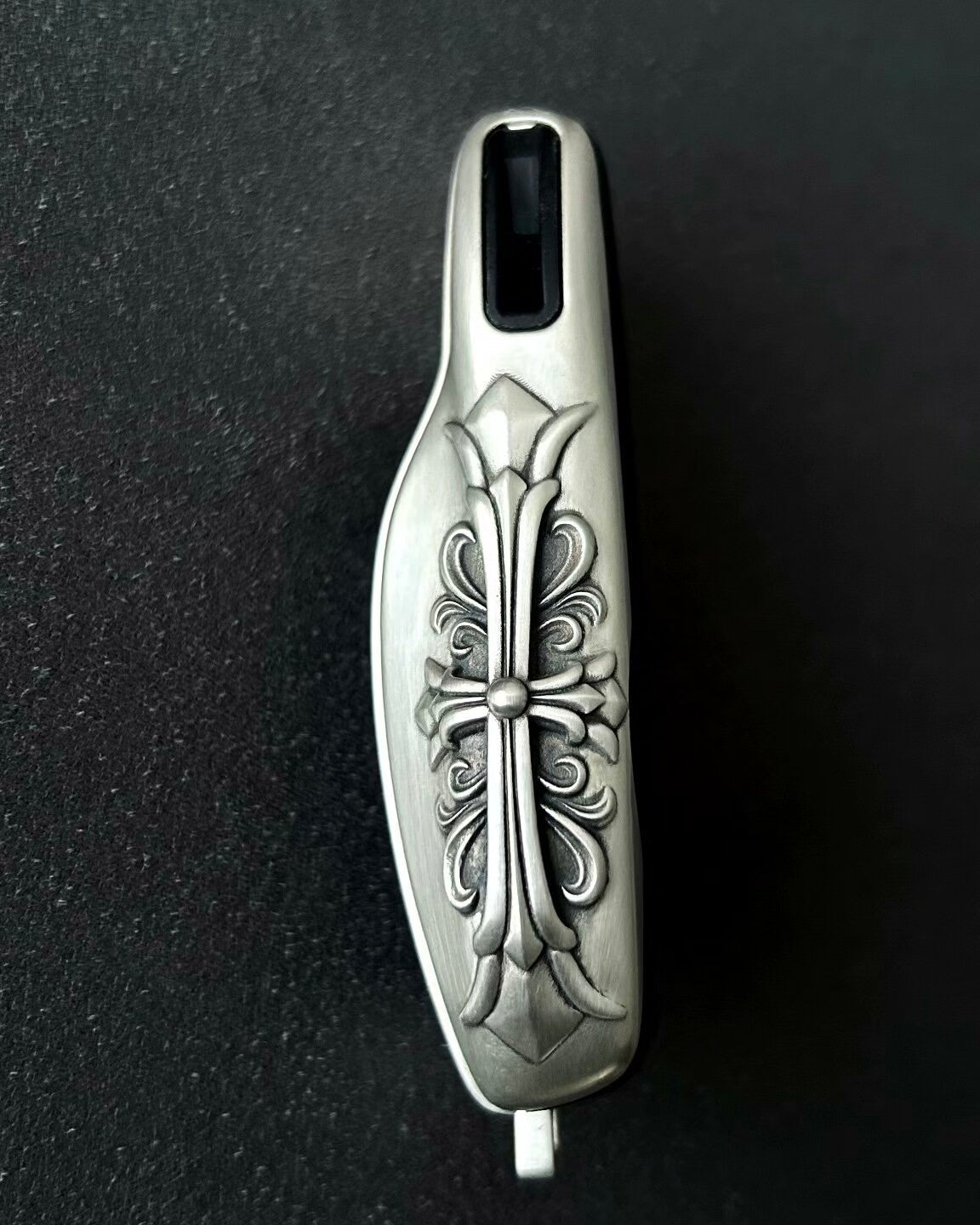 Top angle view of precision-crafted Porsche key case with oxidized accent details