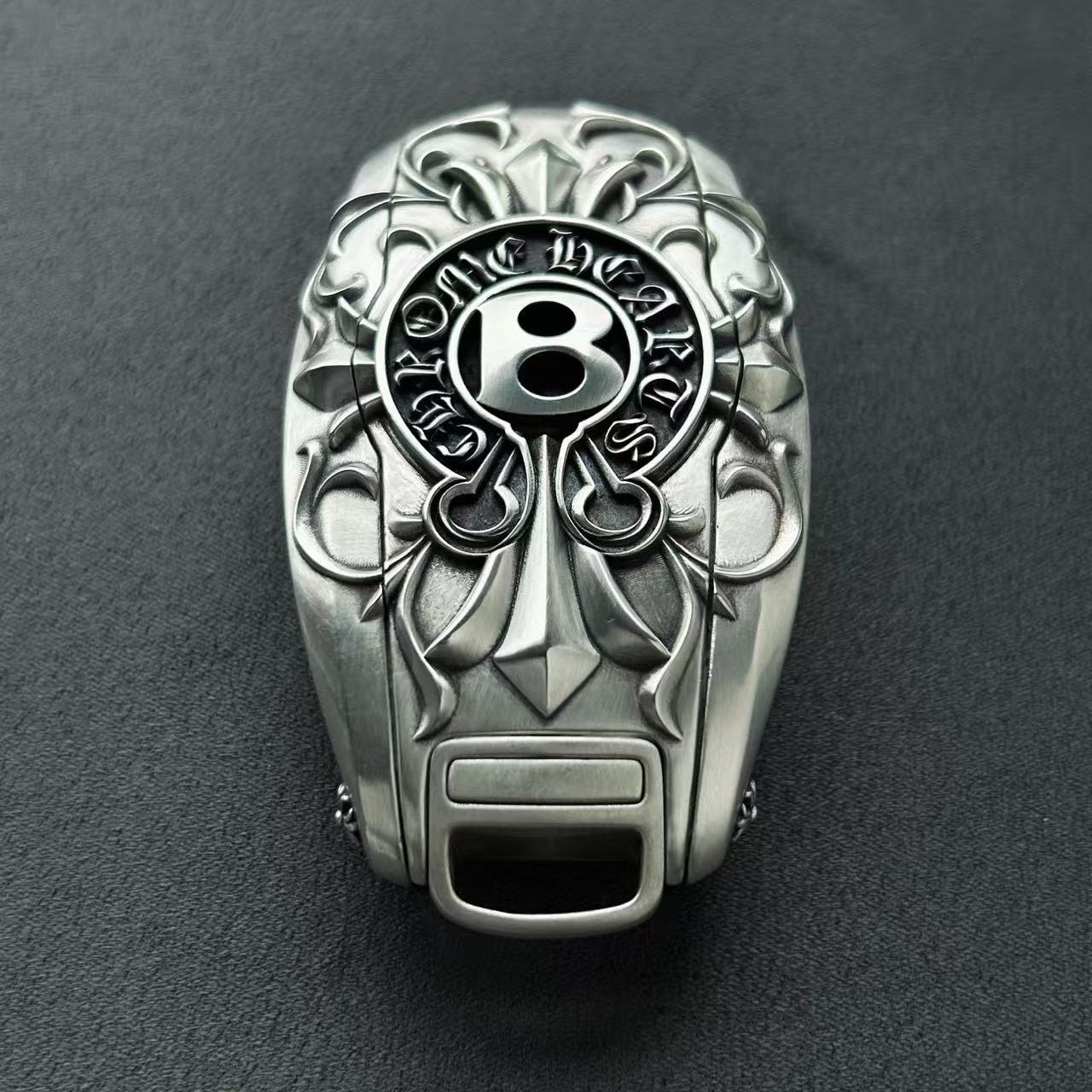 Front engraving detail on a full bespoke custom car key case