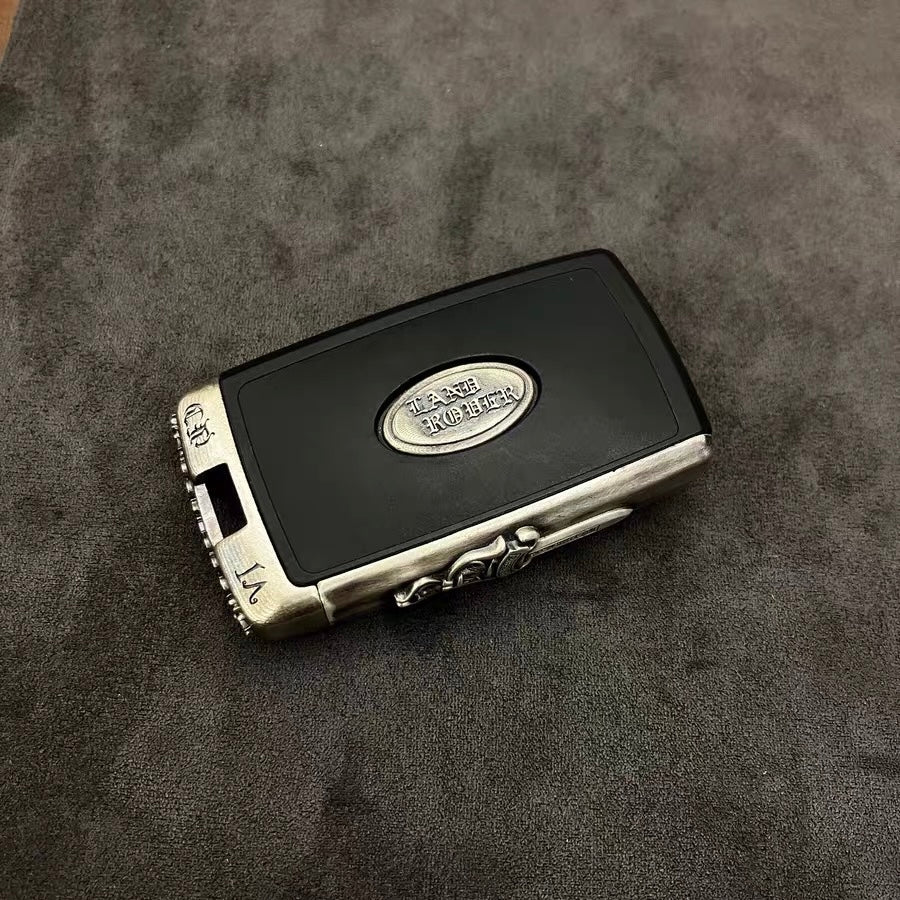 Hand holding a sterling silver smart key case showing practical fit after smart key modification