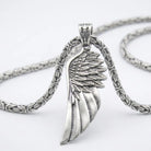 Angel Wing 925 Silver Pendant, held for scale