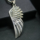 Angel Wing 925 Silver Pendant, worn on a chain