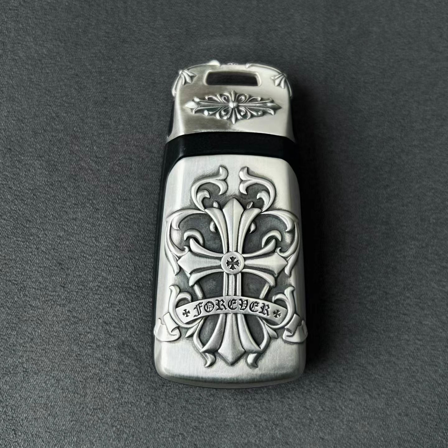 Hand-finished cross pattern detail on IGNIS ARGENTUM Audi tri-layout key case top view showing refined craftsmanship