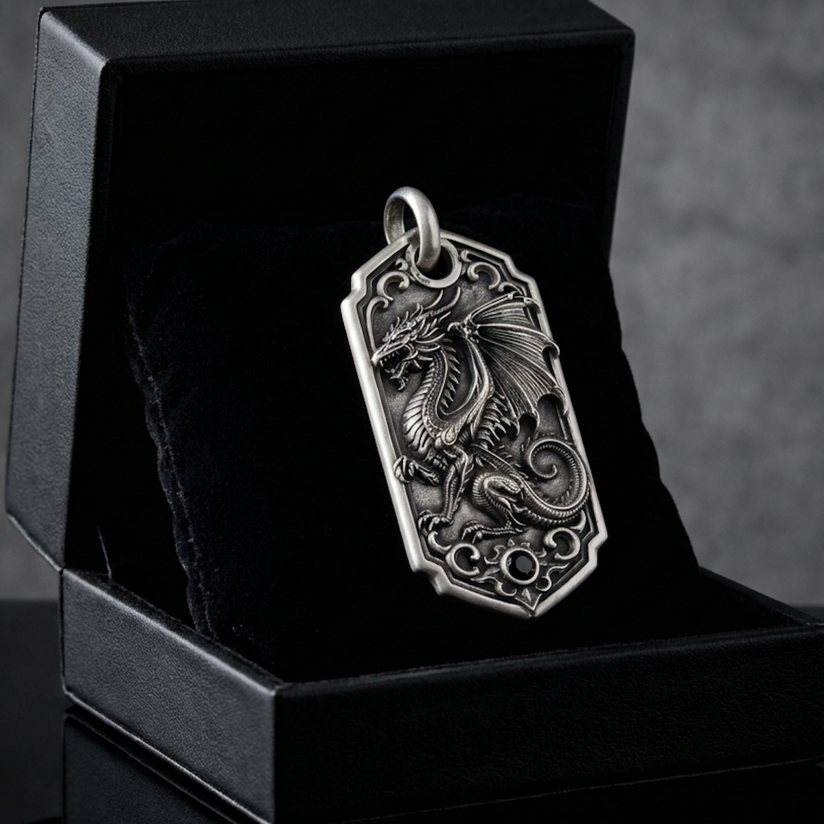 Bespoke dragon-motif key tag, presentation box view