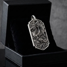 Bespoke dragon-motif key tag, presentation box view