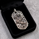 Bespoke dragon-motif key tag, presentation pouch view