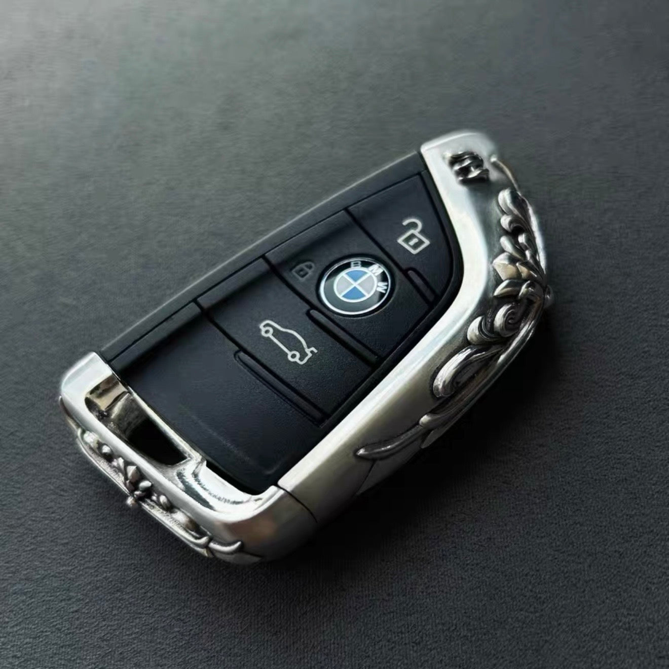 BMW Slim Edge handcrafted key case Nickel Silver front view with refined edge detailing and BMW logo integration on original key fob