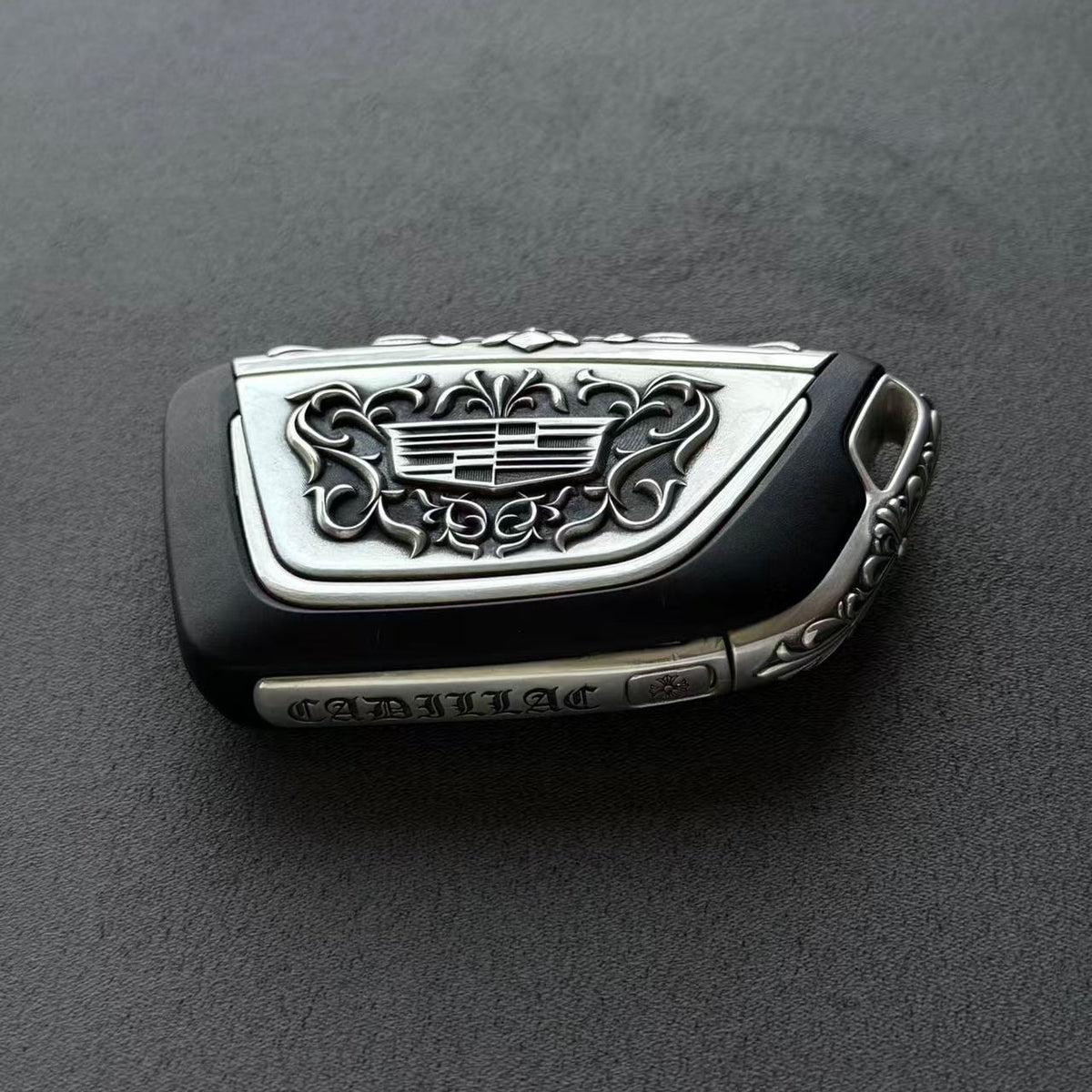 Cadillac Silver Key Case for 4/5/6-Button Keys, front engraving detail