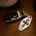 Cathedral Cross Sterling Silver Keychain, front view beside a car key