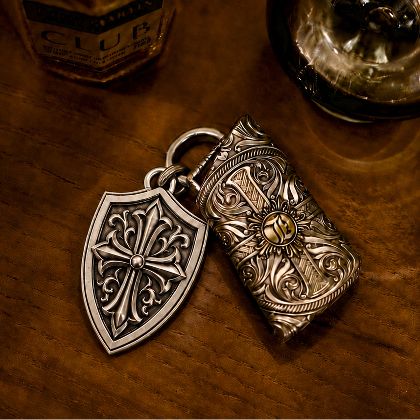 Engraved shield keychain grouped with other handcrafted key accessories