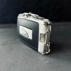 Top angle view of precision-crafted Jaguar key case with corner accent details