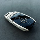 Handcrafted silver car key case, front engraving detail