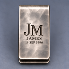Front view of personalized money clip with deep JM monogram name and date engraving