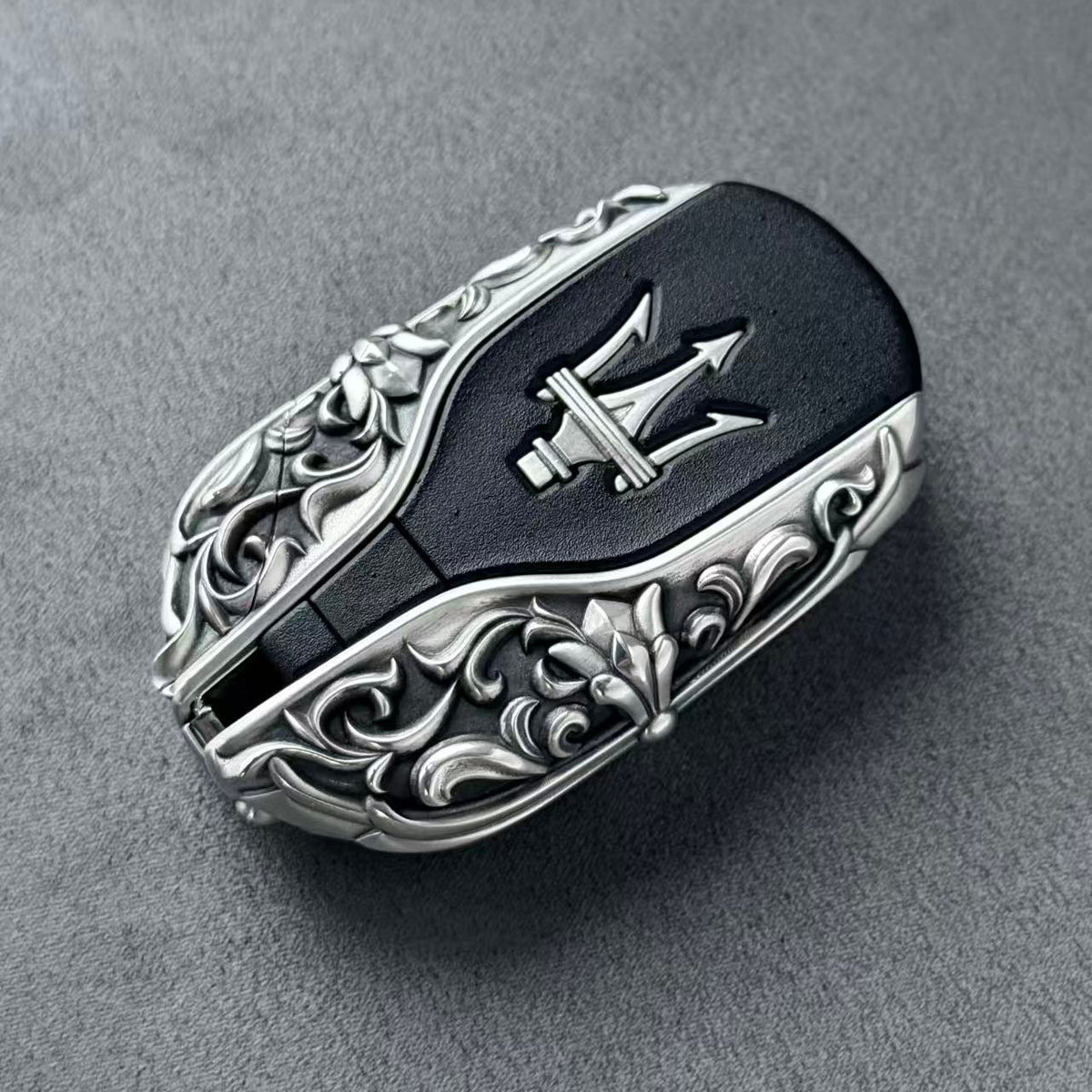Handcrafted silver car key case, front view