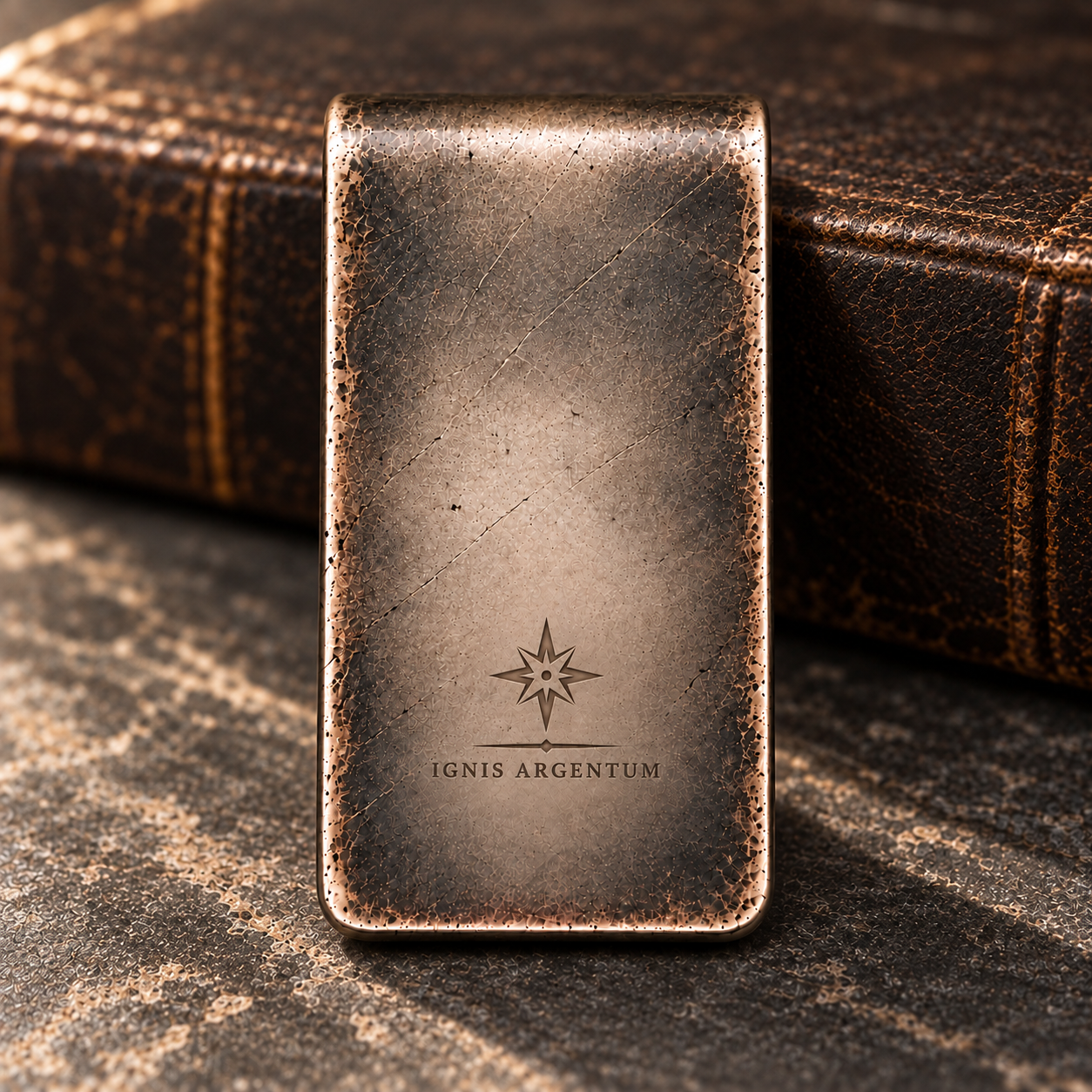 Back of IGNIS ARGENTUM money clip with understated deep engraved logo