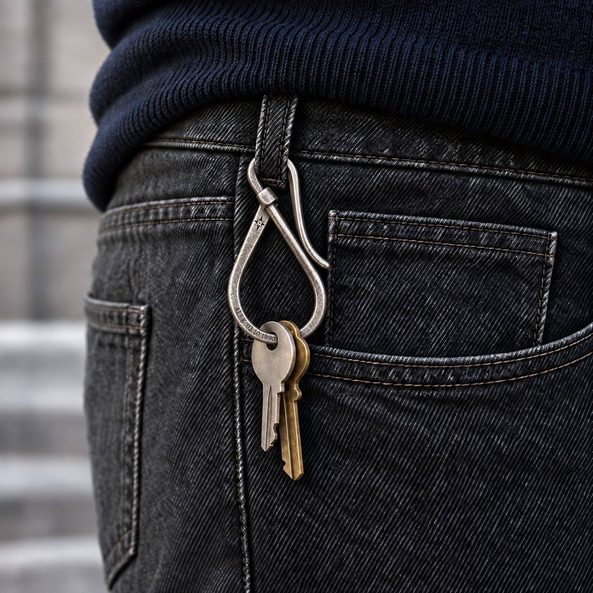 Patina Key Hook at a charcoal denim belt loop with illustrative personal engraving and two styling keys