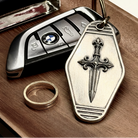 Knight's Dagger Silver Keychain, front view beside a car key