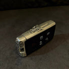 Close-up of the four-button layout on the Land Rover sterling silver case, preserving original functionality with precision cutouts.