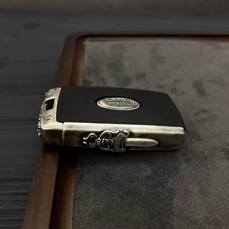 Detailed view of the hand-finished chamfered edges on the Land Rover sword style sterling silver case, ensuring smooth pocket carry.