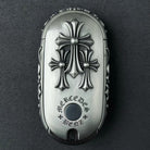 Hand-finished cross pattern detail on IGNIS ARGENTUM Mercedes rounded capsule key case back view showing refined craftsmanship