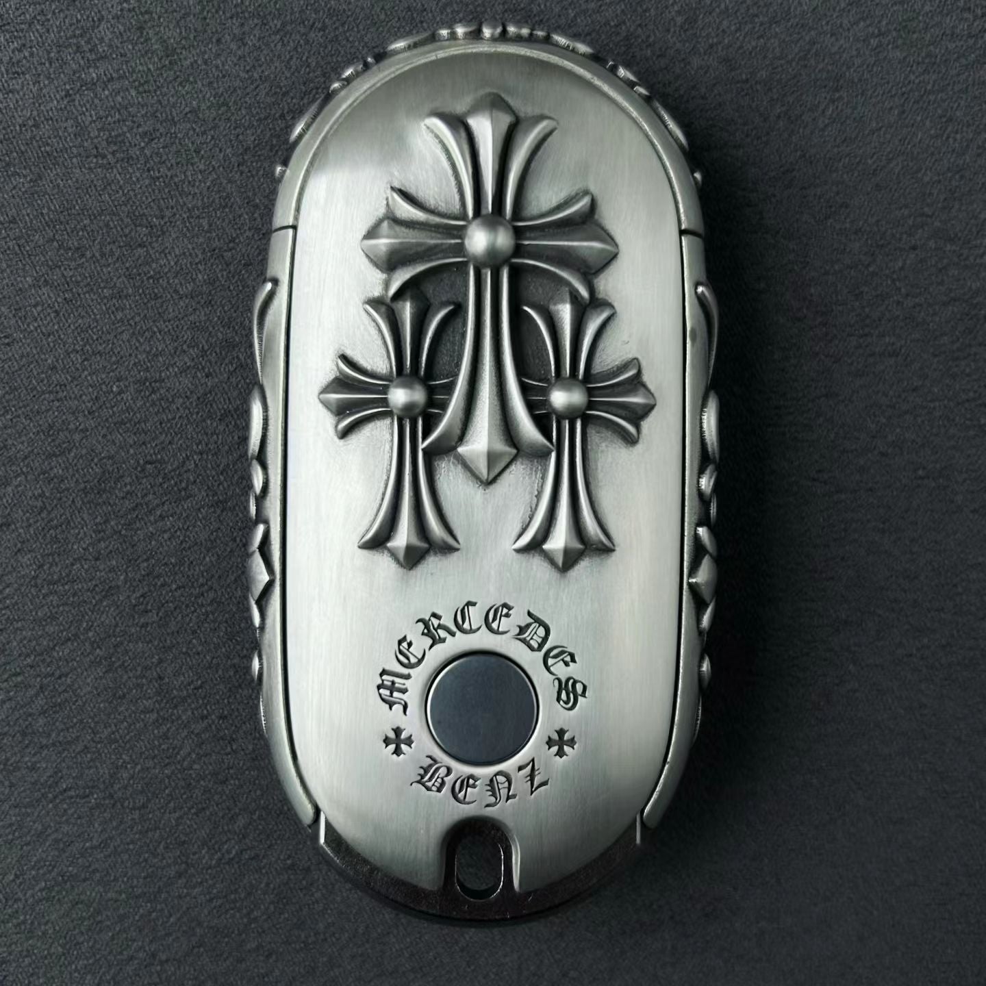 Mercedes Rounded Capsule Button-Covered Key Case, front engraving detail