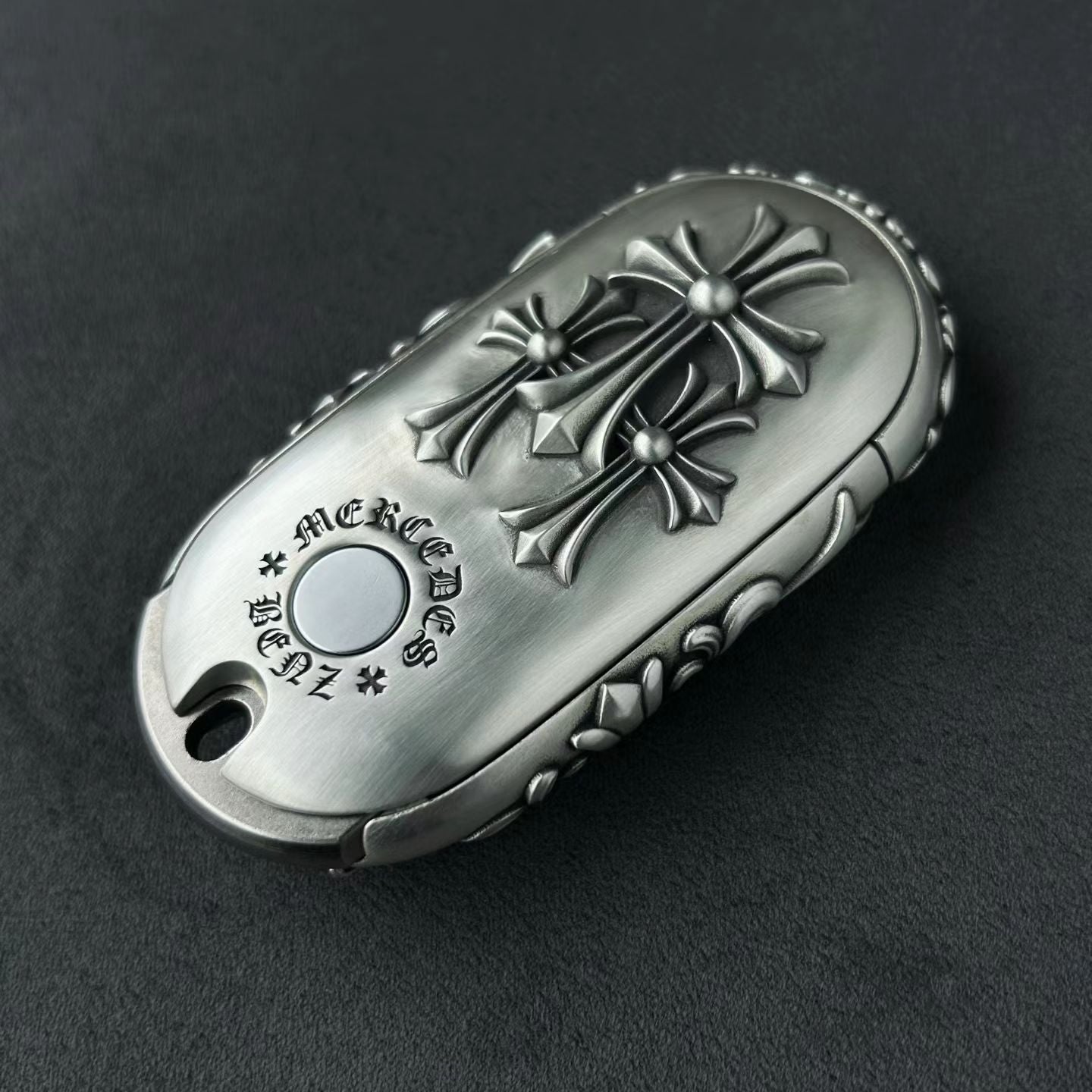 Mercedes Rounded Capsule Silver Key Case, front engraving detail
