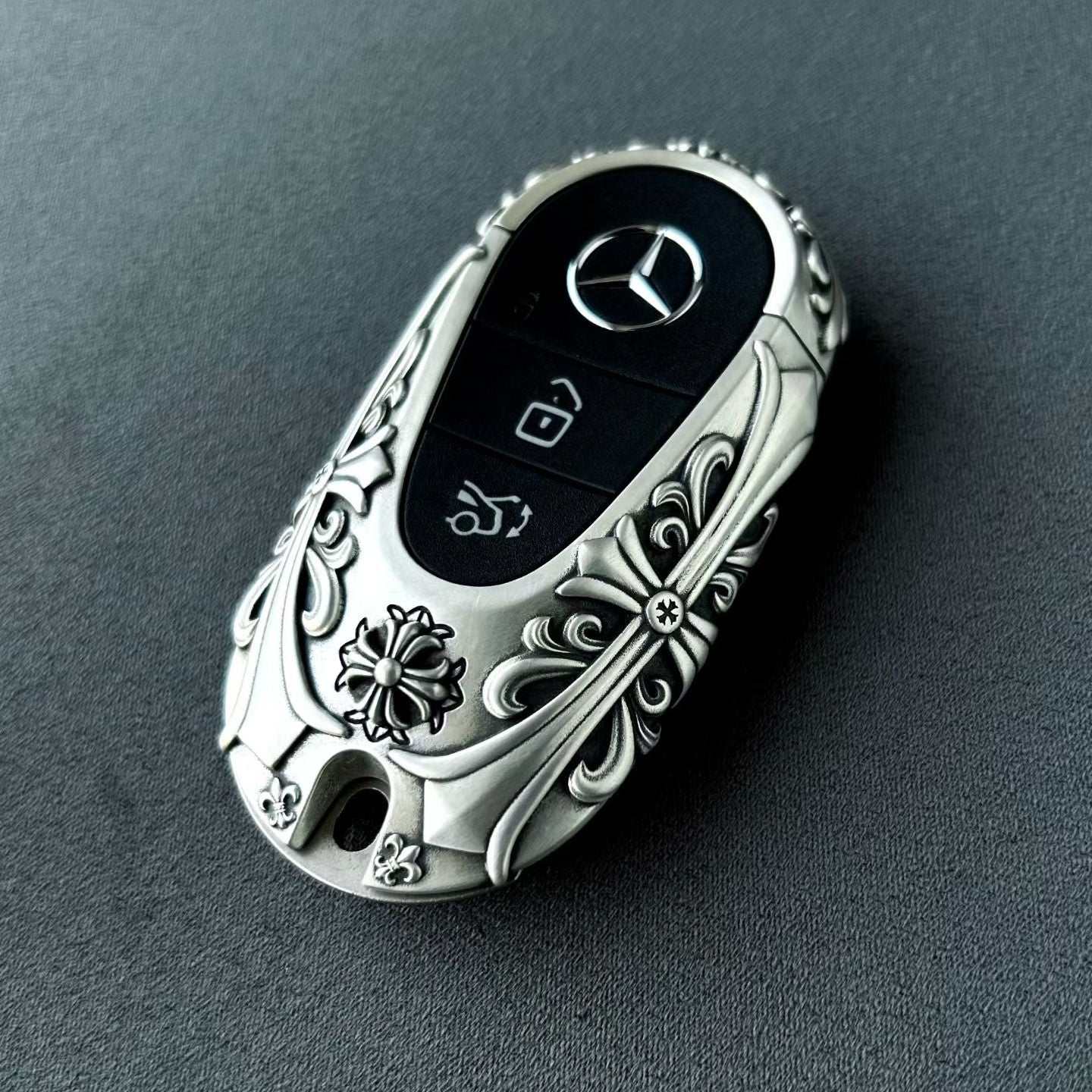 Mercedes Rounded Capsule Silver Key Case, front three-quarter view
